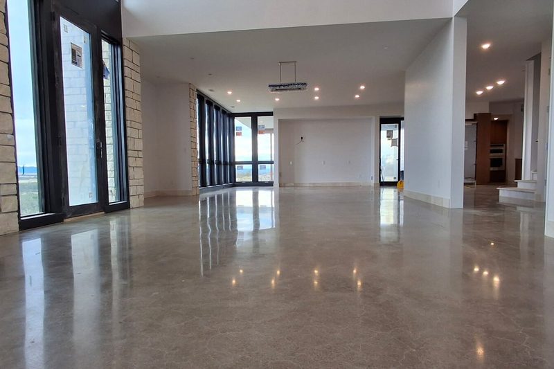 Well-maintained polished concrete floor in a bright Colorado great room