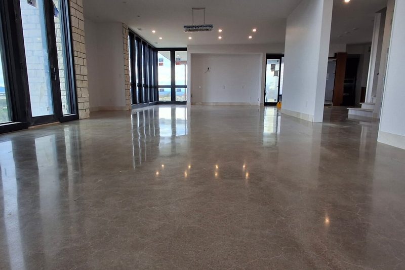 Reflective polished concrete floor in a bright Colorado great room