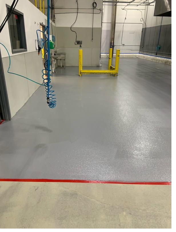 Industrial commercial floor with heavy-duty epoxy system Denver CO