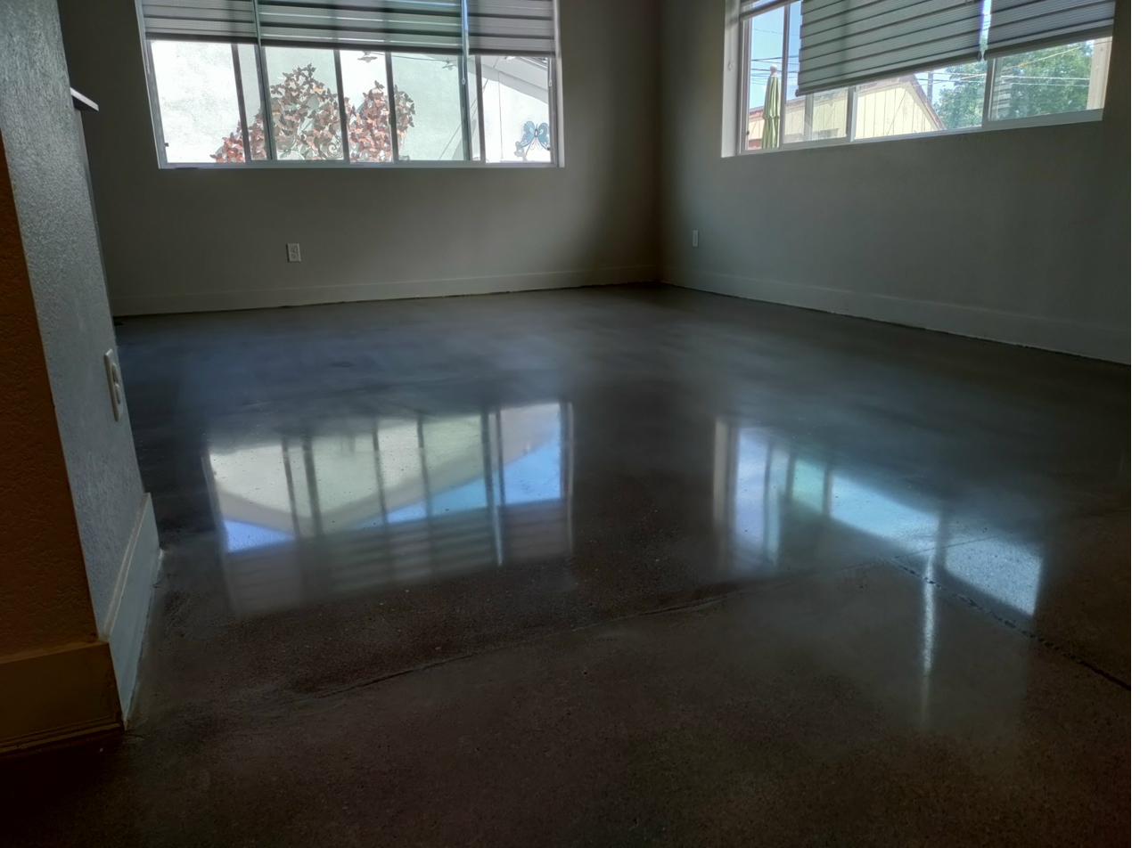 Empty Colorado residential room with polished concrete floor ready for assessment