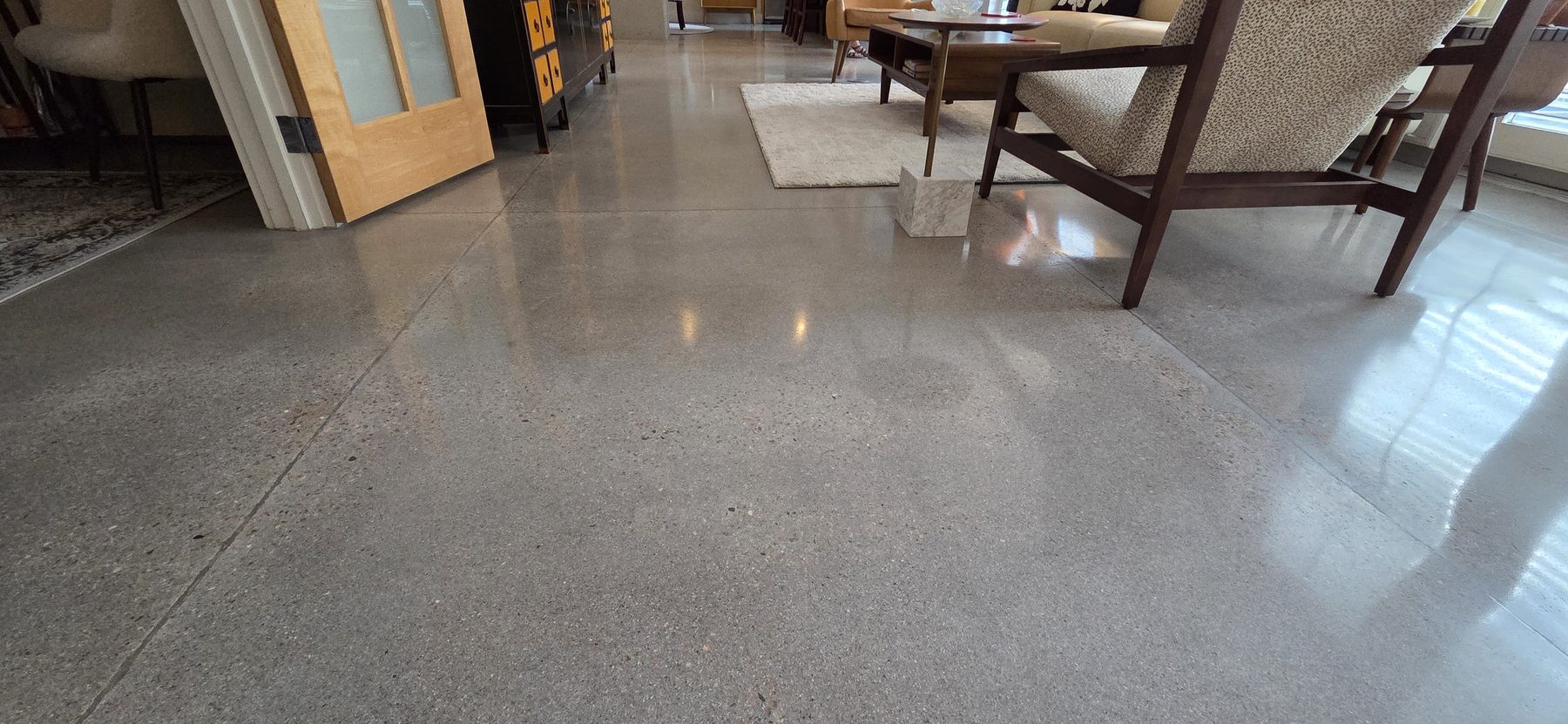 Close-up of polished concrete floor with natural aggregate — Colorado