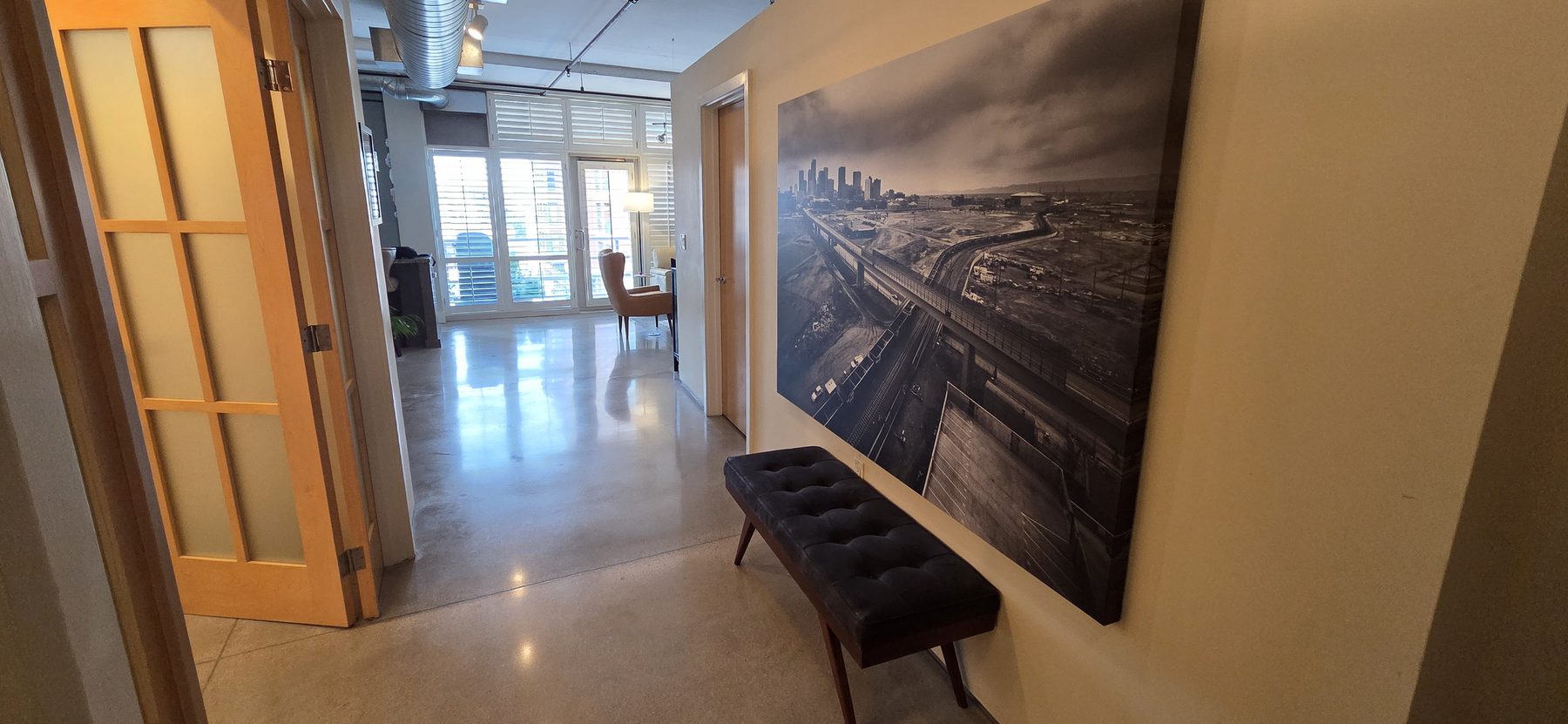 Polished concrete hallway and living space — Denver loft